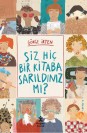 Siz Hiç Bir Kitaba Sarıldınız Mı?